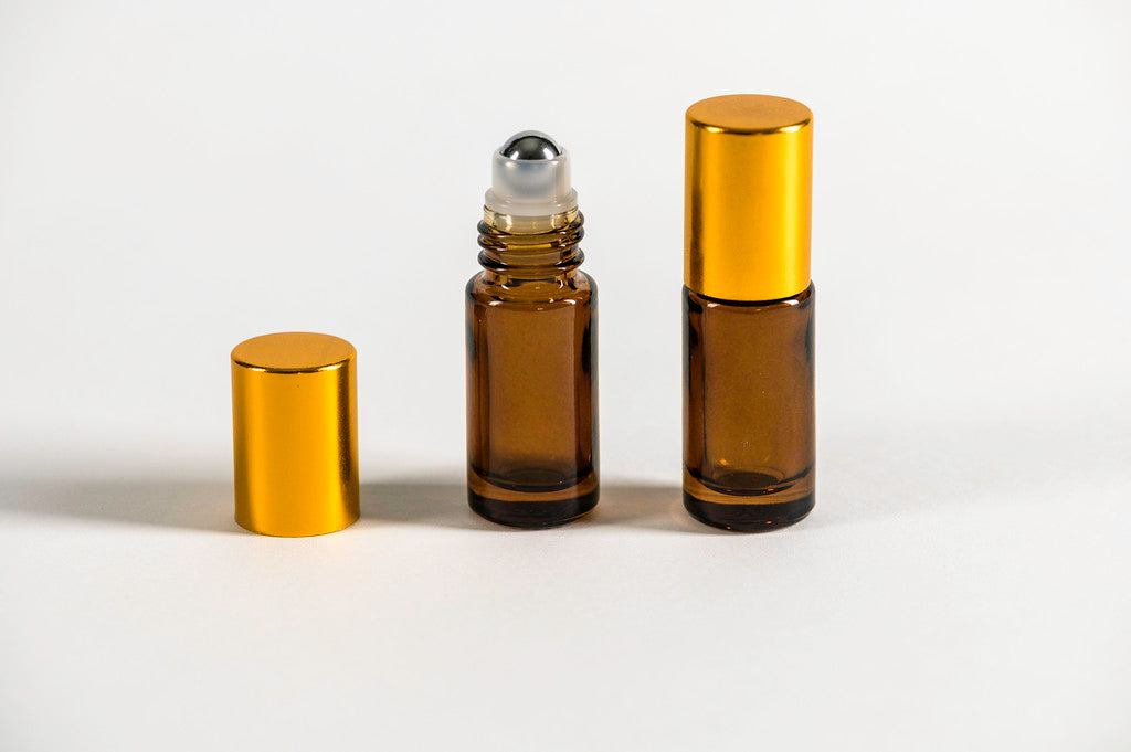 Pack 240 Roll on 5 ml vidrio grueso ámbar tapa dorada bola
