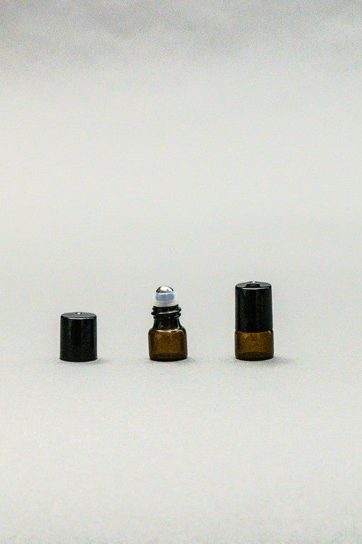 Roll on 1 ml vidrio ámbar tapa negra bola