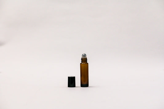 Roll on 10 ml vidrio grueso ámbar tapa negra bola