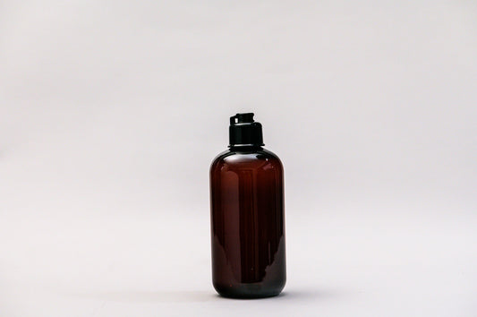 Botella 250 ml plástico ámbar con tapa cantimplora negra 24/410
