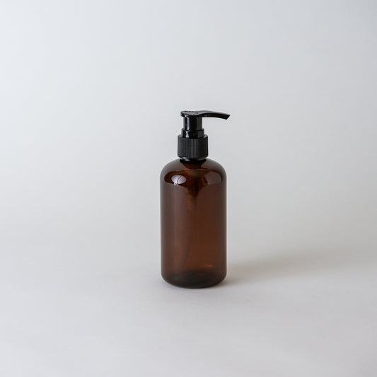 Botella 250 ml plástico ámbar con dispensador loción negro 24/410